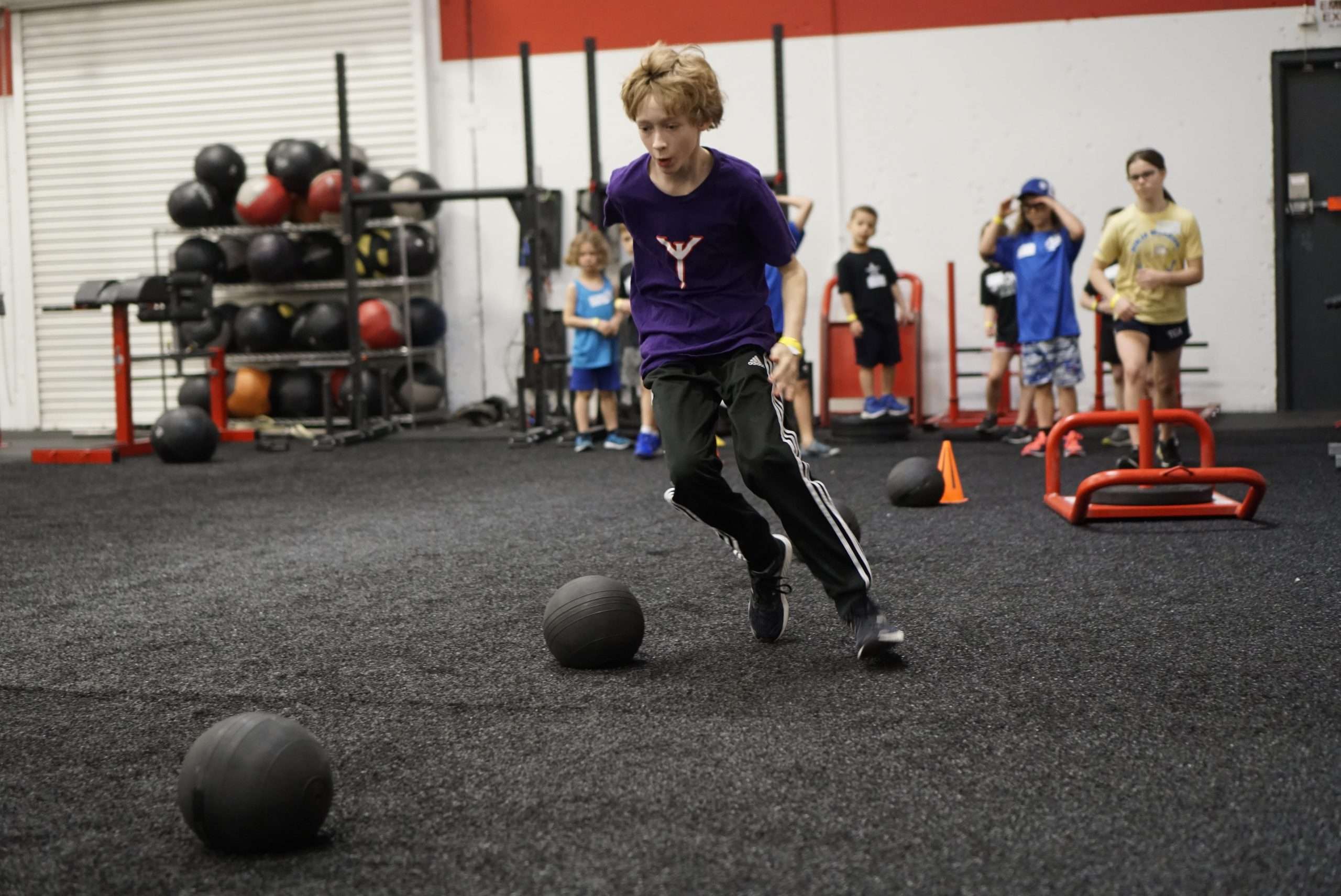 Strong Youth program: fostering movement versatility through strength, agility, and coordination training for young athletes.